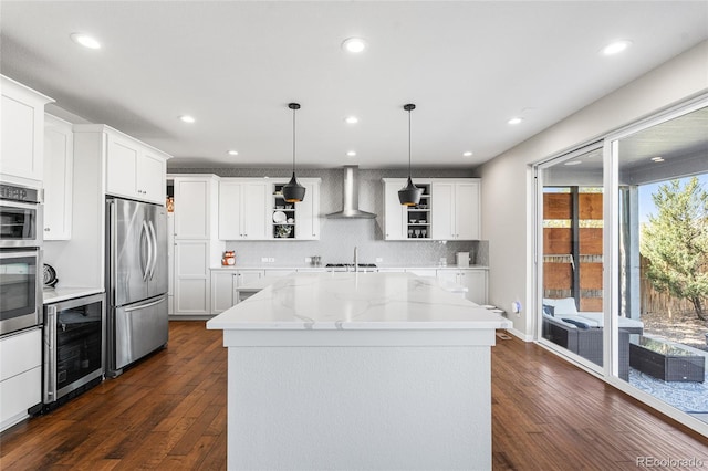 11023 Pastel Pt, Parker, CO 80134 - kitchen with wall chimney range hood, stainless steel built in fridge, open shelves, wine cooler, and dark wood-type flooring
