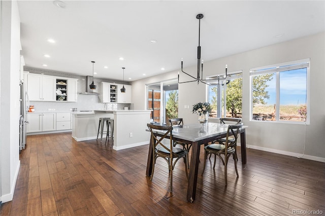 11023 Pastel Pt, Parker, CO 80134 - dining room featuring recessed lighting, baseboards, and dark wood finished floors