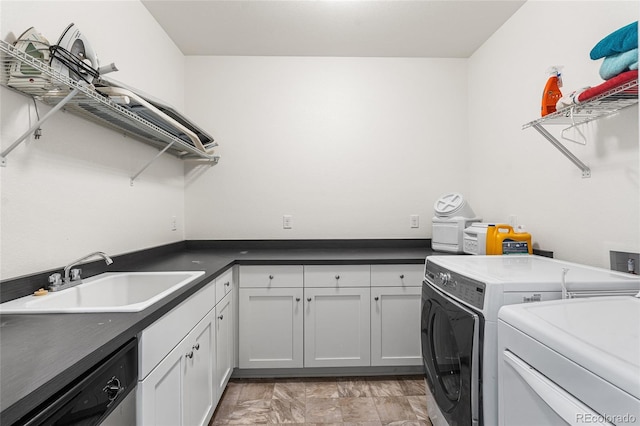 11023 Pastel Pt, Parker, CO 80134 - laundry room with a sink, cabinet space, and washer and clothes dryer