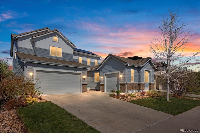 11023 Pastel Pt, Parker, CO 80134 - traditional-style house with an attached garage and concrete driveway
