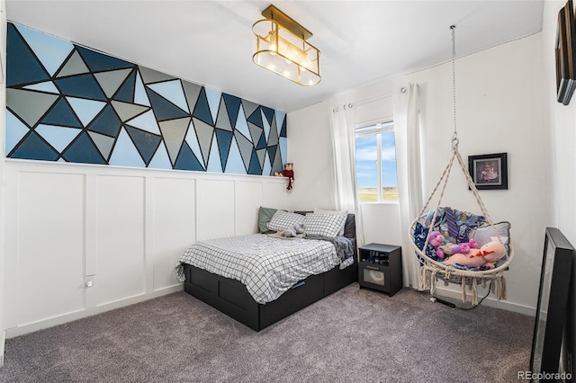 11023 Pastel Pt, Parker, CO 80134 - carpeted bedroom featuring a decorative wall