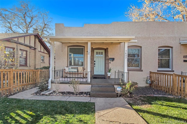 view of front of home featuring covered porch