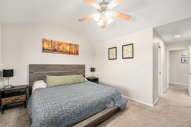 10818 Cimarron St Unit 206, Firestone, CO 80504 - bedroom with light colored carpet, baseboards, vaulted ceiling, and a ceiling fan