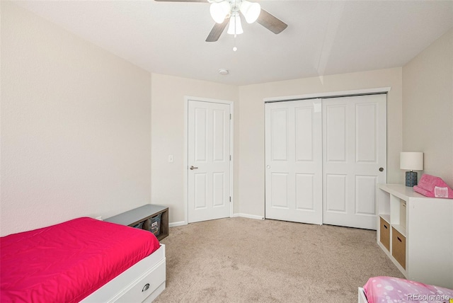 10818 Cimarron St Unit 206, Firestone, CO 80504 - bedroom featuring carpet floors, a closet, ceiling fan, and baseboards