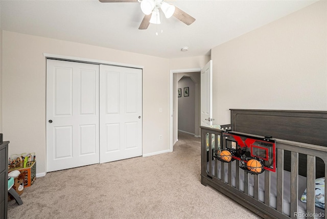 10818 Cimarron St Unit 206, Firestone, CO 80504 - bedroom featuring carpet flooring, baseboards, a closet, and ceiling fan