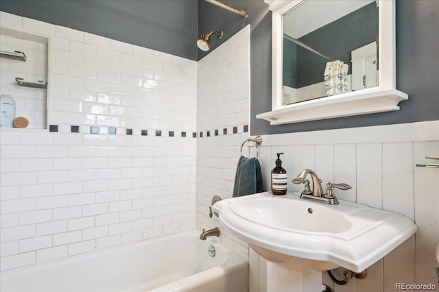 3622 Lowell Blvd, Denver, CO 80211 - bathroom featuring shower / bath combination with curtain and wainscoting