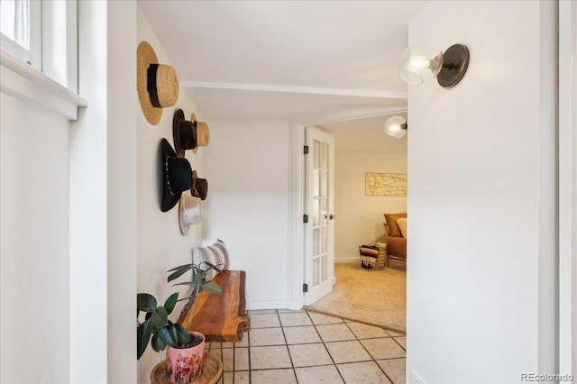 3622 Lowell Blvd, Denver, CO 80211 - hallway featuring light carpet and light tile patterned floors