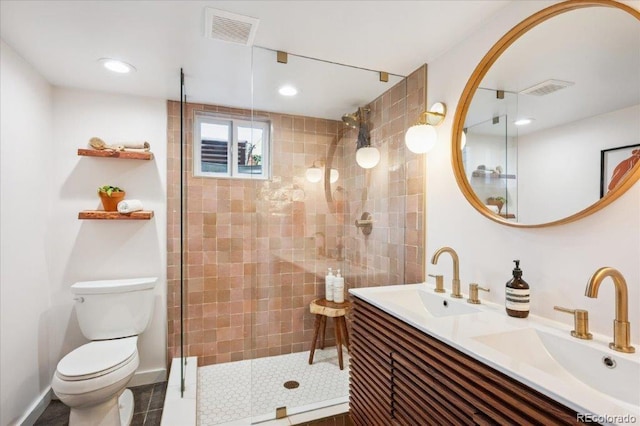 3622 Lowell Blvd, Denver, CO 80211 - bathroom featuring tiled shower, double vanity, and recessed lighting