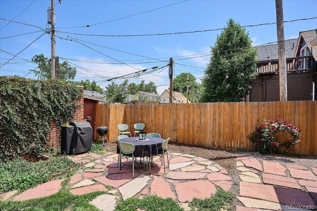 3622 Lowell Blvd, Denver, CO 80211 - fenced backyard featuring a patio and area for grilling