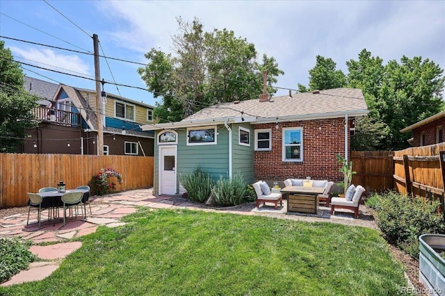 3622 Lowell Blvd, Denver, CO 80211 - back of house featuring an outdoor living space, a patio, a fenced backyard, roof with shingles, and brick siding
