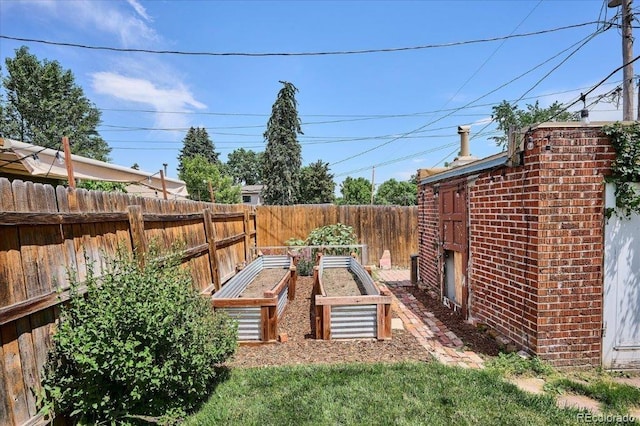 3622 Lowell Blvd, Denver, CO 80211 - fenced backyard with a garden