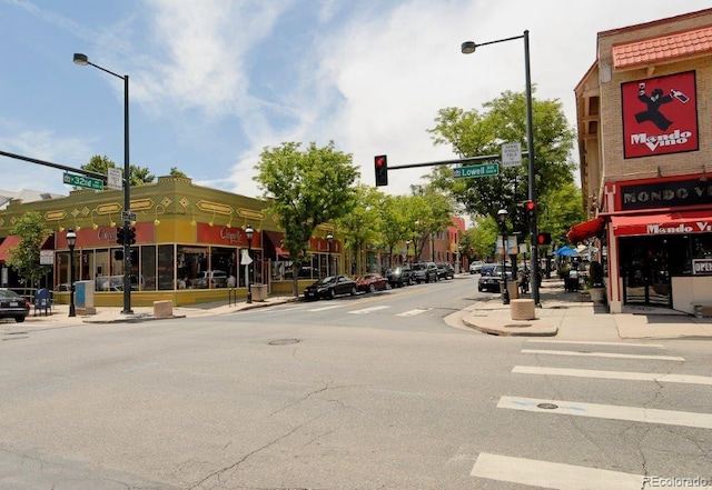 3622 Lowell Blvd, Denver, CO 80211 - view of asphalt road featuring street lights, sidewalks, traffic lights, and curbs