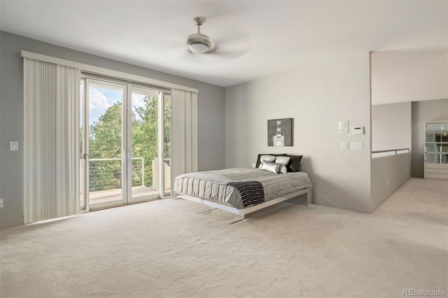 carpeted bedroom with access to exterior and ceiling fan