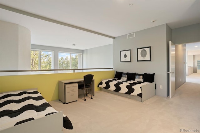 bedroom with carpet floors and visible vents