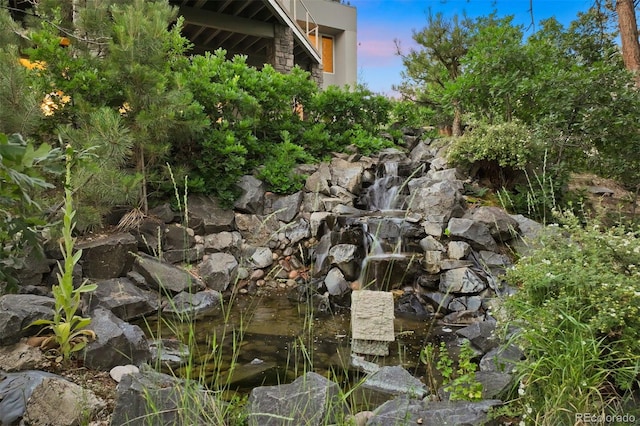 details featuring a garden pond