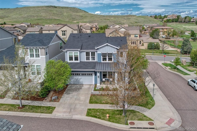10365 Prairie Sky Pl, Lone Tree, CO 80124 - aerial view of residential area featuring a mountain backdrop
