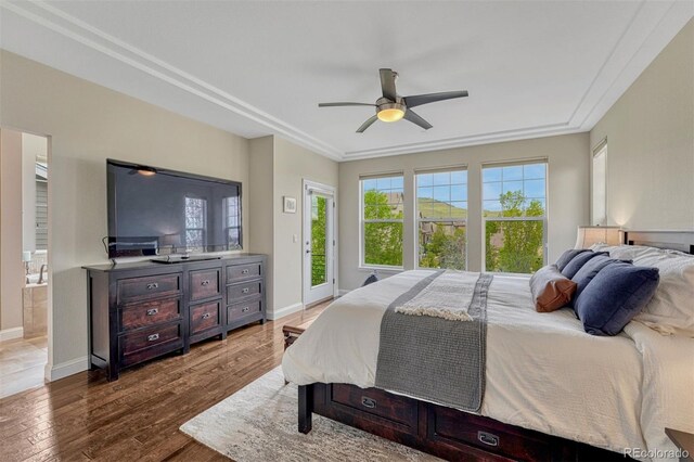 10365 Prairie Sky Pl, Lone Tree, CO 80124 - bedroom featuring access to exterior, dark wood finished floors, ceiling fan, and ensuite bathroom