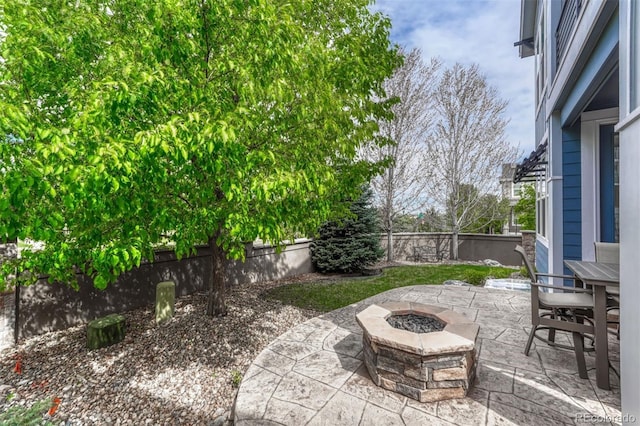 10365 Prairie Sky Pl, Lone Tree, CO 80124 - view of patio / terrace with an outdoor fire pit