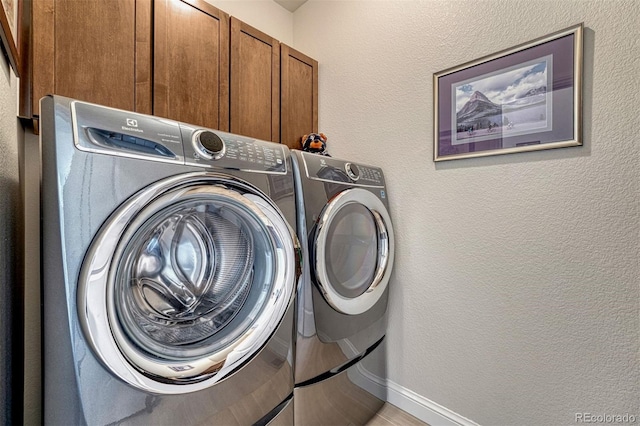 10365 Prairie Sky Pl, Lone Tree, CO 80124 - washroom with washer and dryer and cabinet space