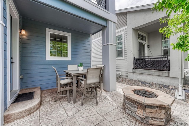 10365 Prairie Sky Pl, Lone Tree, CO 80124 - view of patio featuring an outdoor fire pit and outdoor dining space