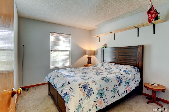 8555 Angela Ln, Parker, CO 80134 - bedroom featuring light colored carpet, baseboards, and a textured ceiling