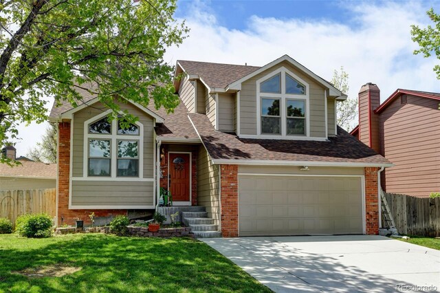 8555 Angela Ln, Parker, CO 80134 - view of front facade featuring brick siding, concrete driveway, a garage, and a shingled roof