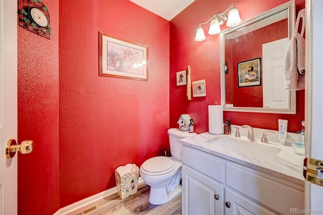 9172 Sunningdale Rd, Peyton, CO 80831 - half bathroom with a textured wall, wood finished floors, and toilet
