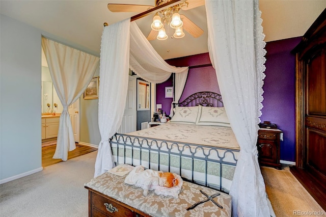 9172 Sunningdale Rd, Peyton, CO 80831 - carpeted bedroom featuring baseboards, a ceiling fan, and ensuite bath