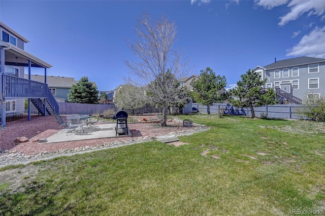 9172 Sunningdale Rd, Peyton, CO 80831 - view of yard with a fenced backyard, a patio area, stairway, and a residential view