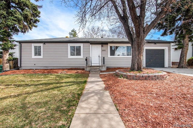 3092 S Kearney St, Denver, CO 80222 - ranch-style house featuring a front yard, concrete driveway, and a garage