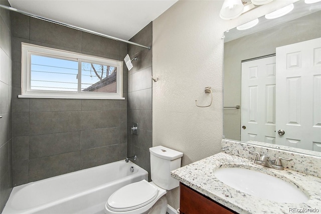 3092 S Kearney St, Denver, CO 80222 - full bathroom with toilet, a textured wall, vanity, and bathing tub / shower combination