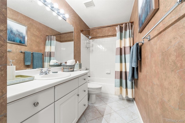 full bathroom featuring tile patterned floors, vanity, toilet, and shower / tub combo with curtain