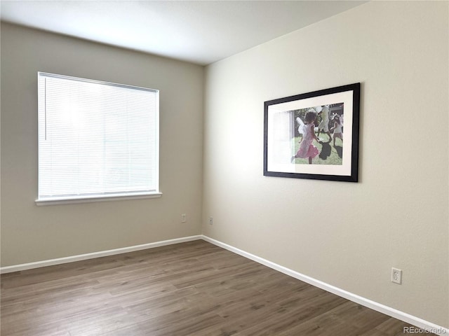 4451 S Ammons St Unit 108, Littleton, CO 80123 - empty room with wood finished floors and baseboards