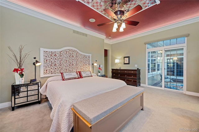 bedroom with visible vents, light colored carpet, ornamental molding, and access to exterior