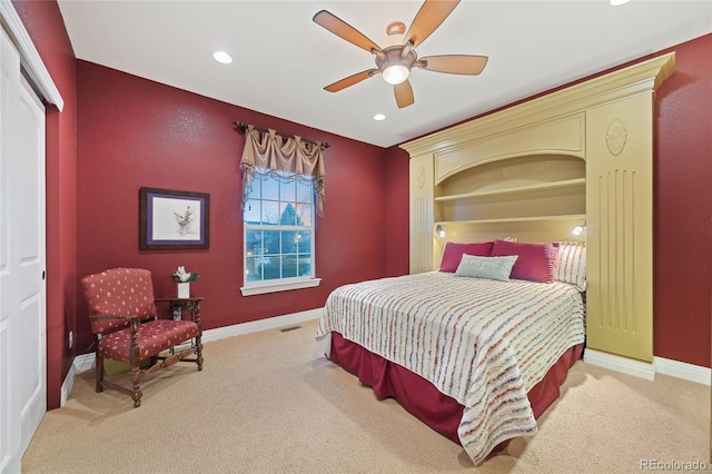 carpeted bedroom with visible vents, recessed lighting, a ceiling fan, and baseboards