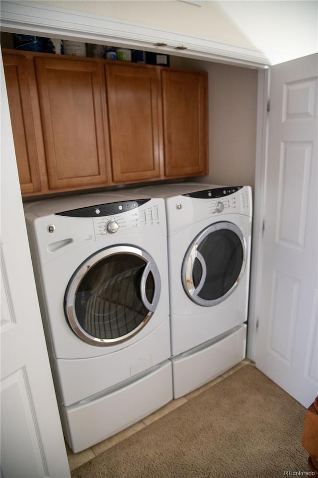 16180 E Geddes Ln Unit 14, Aurora, CO 80016 - laundry area with separate washer and dryer and cabinet space