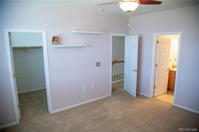 16180 E Geddes Ln Unit 14, Aurora, CO 80016 - unfurnished bedroom featuring carpet flooring, a spacious closet, and ensuite bath