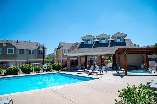 16180 E Geddes Ln Unit 14, Aurora, CO 80016 - community pool with a patio area and a residential view