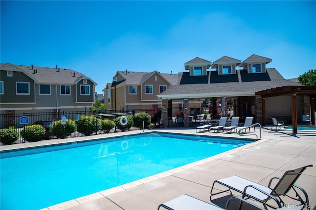 16180 E Geddes Ln Unit 14, Aurora, CO 80016 - community pool featuring a patio area and a residential view