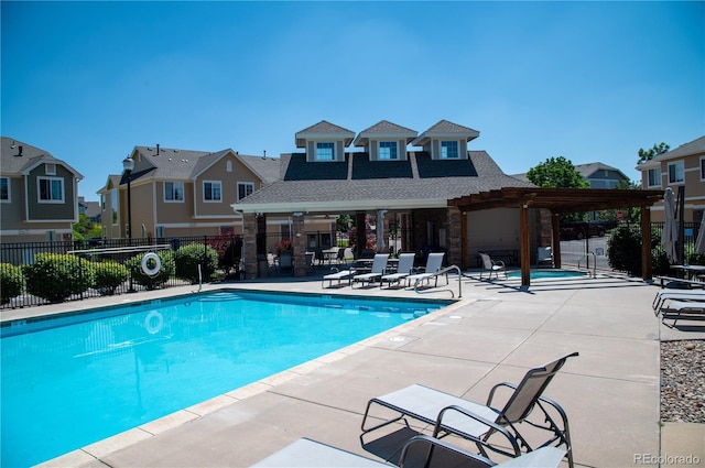 16180 E Geddes Ln Unit 14, Aurora, CO 80016 - community pool with a pergola, a residential view, and a patio area
