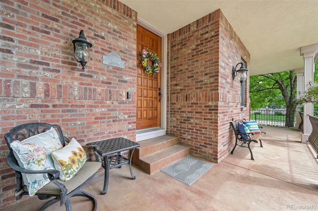 exterior space with brick siding