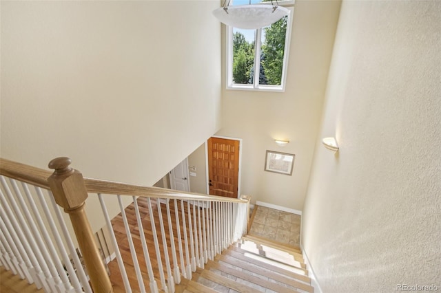 stairway with baseboards