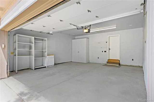 7888 S Poplar Way, Centennial, CO 80112 - garage featuring a garage door opener
