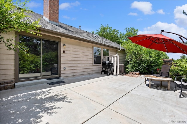 7888 S Poplar Way, Centennial, CO 80112 - view of patio / terrace featuring a grill