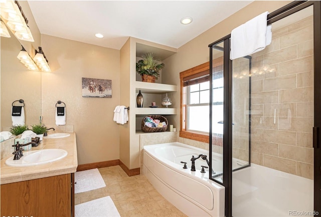 bathroom with shower with separate bathtub and vanity