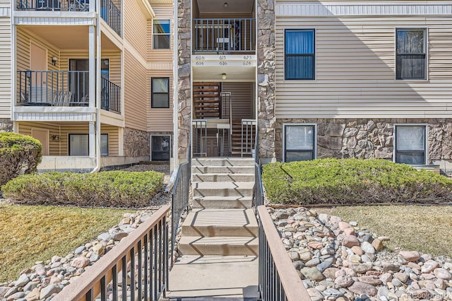 view of building exterior featuring stairway