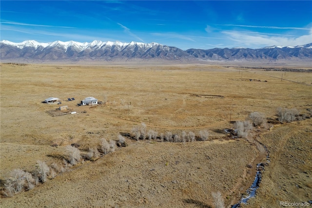 property view of mountains featuring a rural view