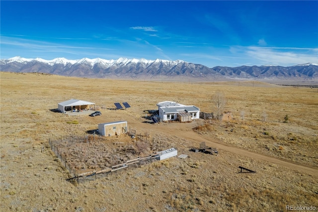 bird's eye view with a rural view and a mountain view