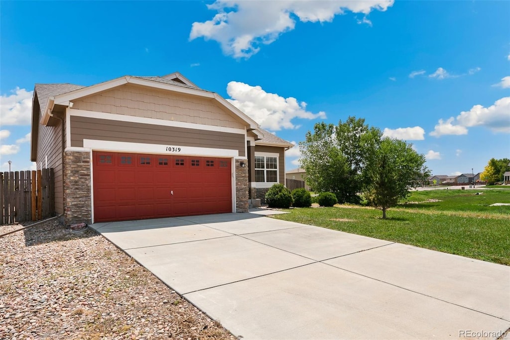 view of front facade with a front yard