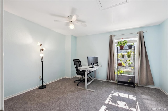 office featuring attic access, carpet floors, baseboards, and a ceiling fan